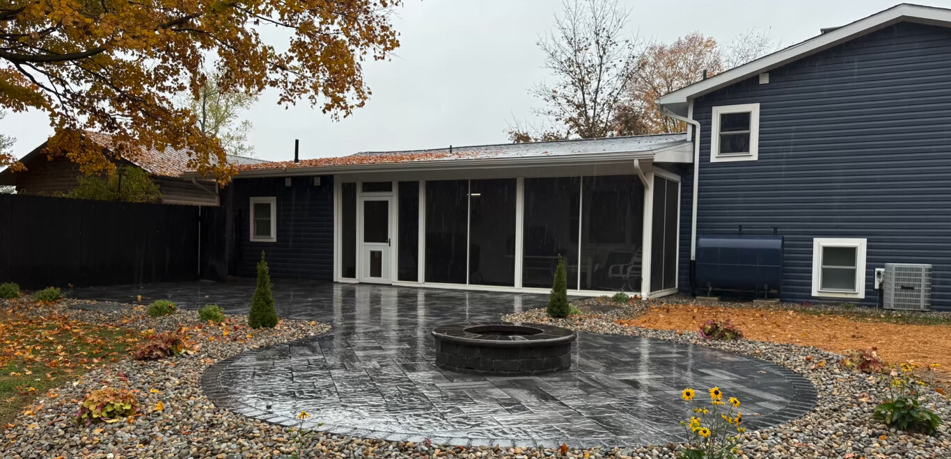 Durable stamped concrete patio with fire pit in Hawthorne